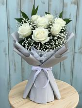 Букет цветов из:  Розы в Барабинске